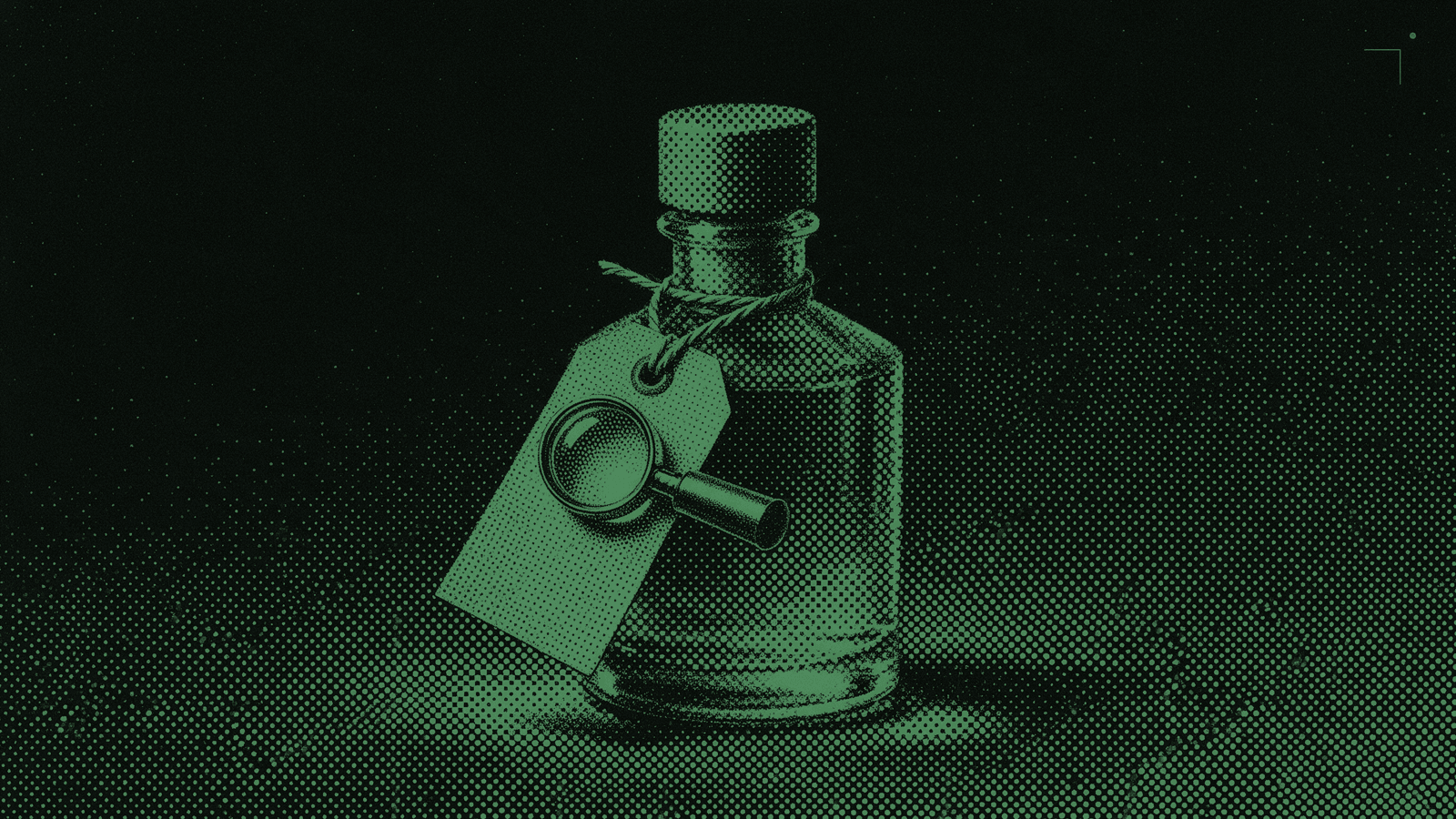 A glass perfume bottle with a paper tag tied to its neck by string, a magnifying glass resting on the tag