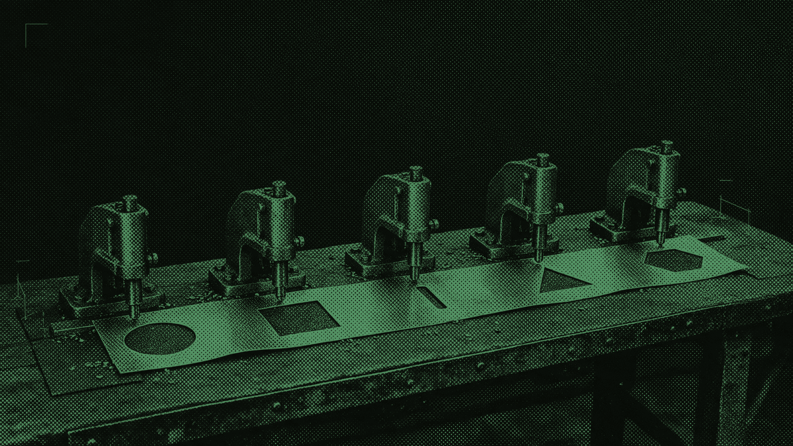 A row of identical machine presses, each stamping a different shape out of the same sheet of metal
