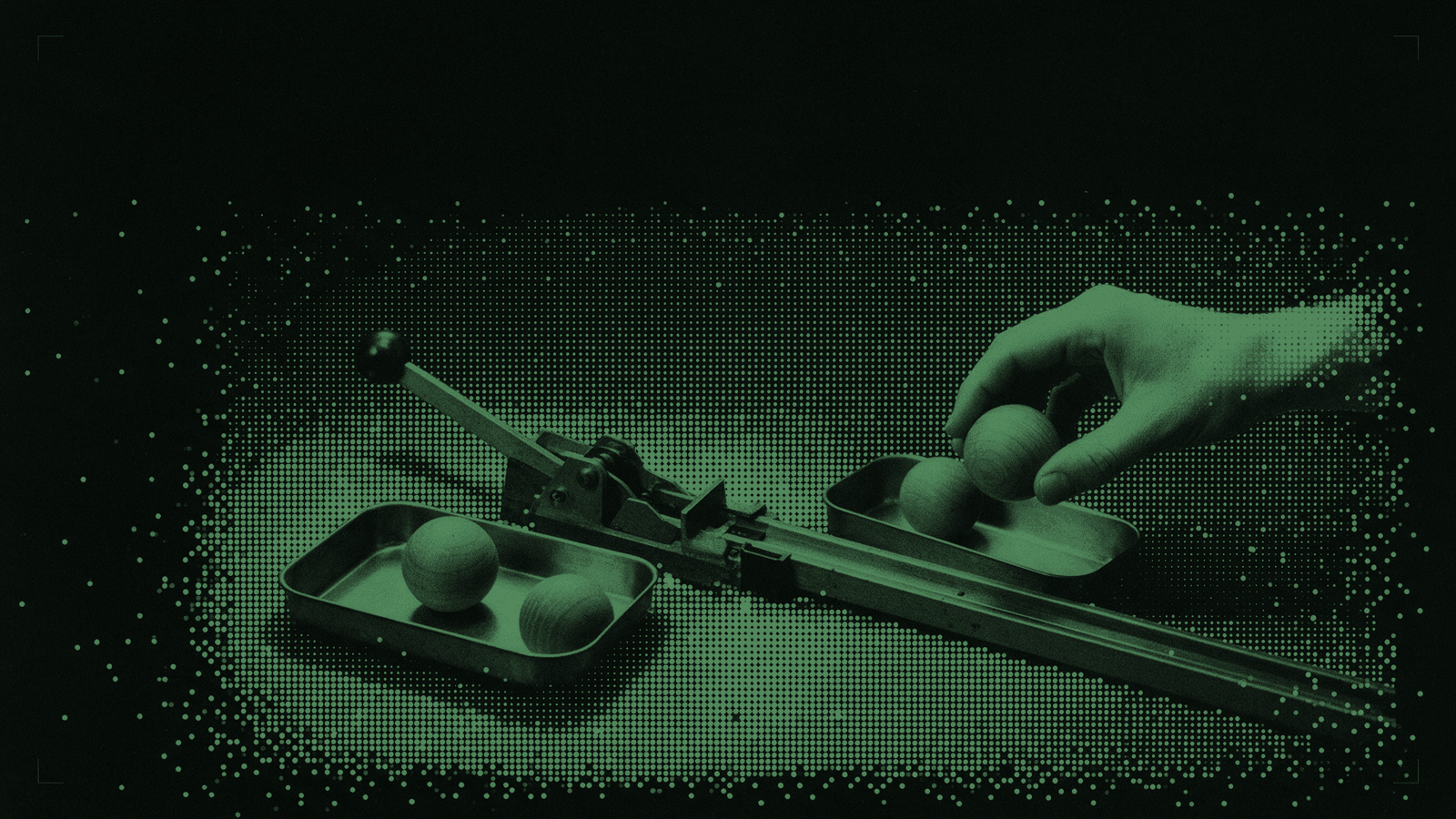 A hand beside an unmarked mechanical lever and branching tracks
