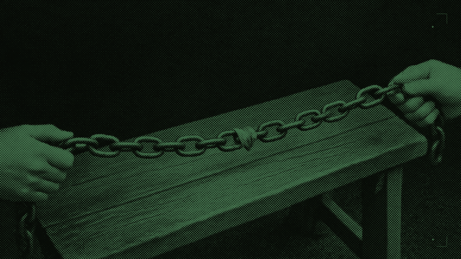 A chain of forged iron links stretched taut across a bench, one link bound in cloth