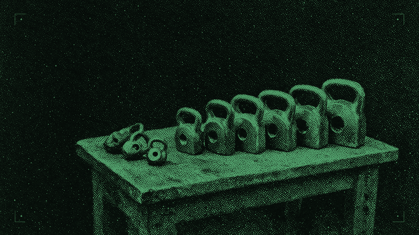 A set of graduated weights on a bench, the smallest ones swept aside